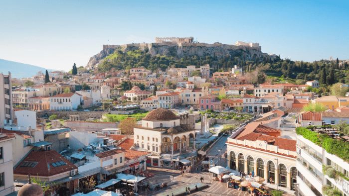 Monastiraki Square in Athens with the Acropolis rising above the city, a classic first stop on an Athens and islands itinerary.